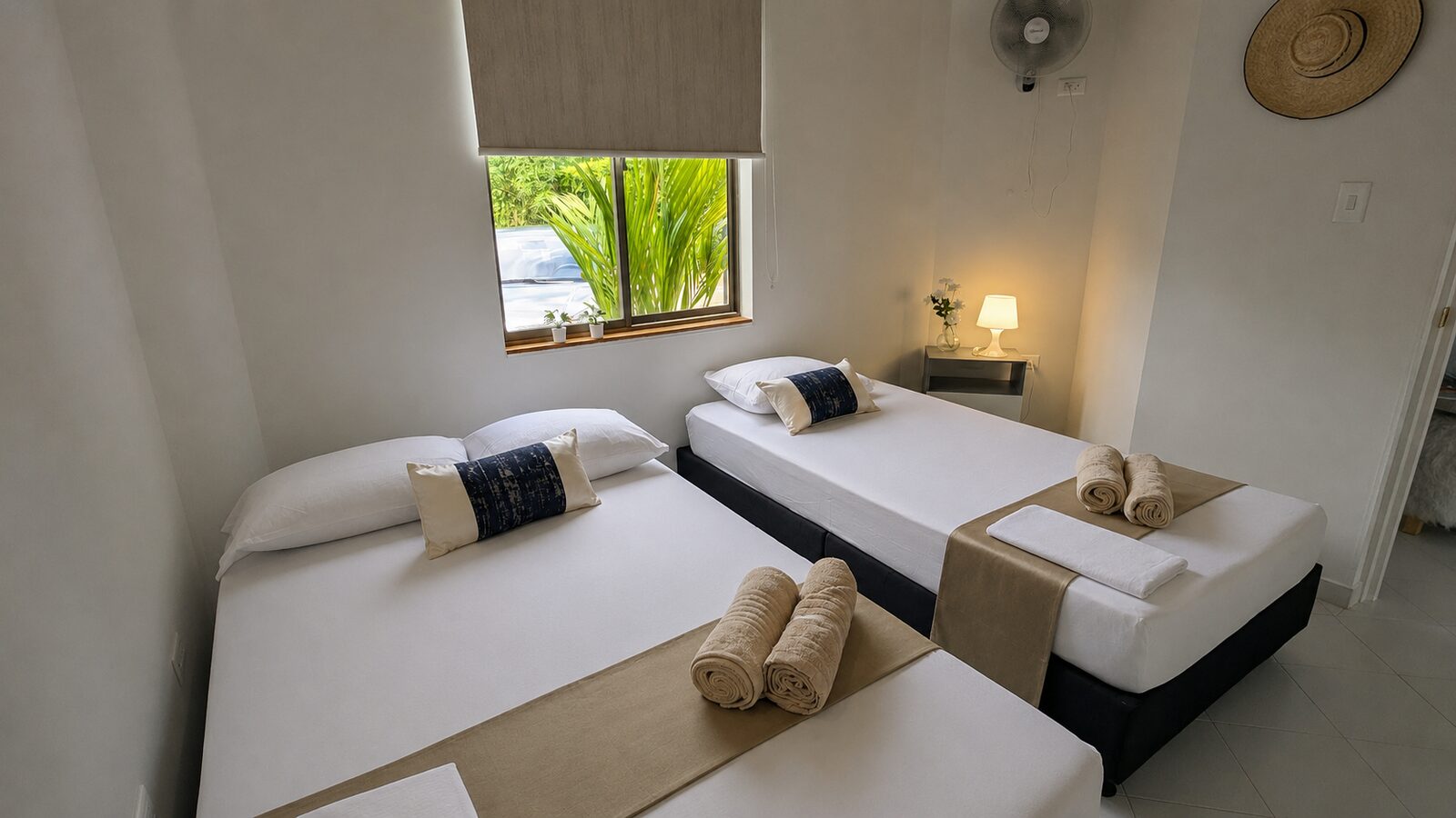 Family room with two beds at Casa Encanto de Melgar
