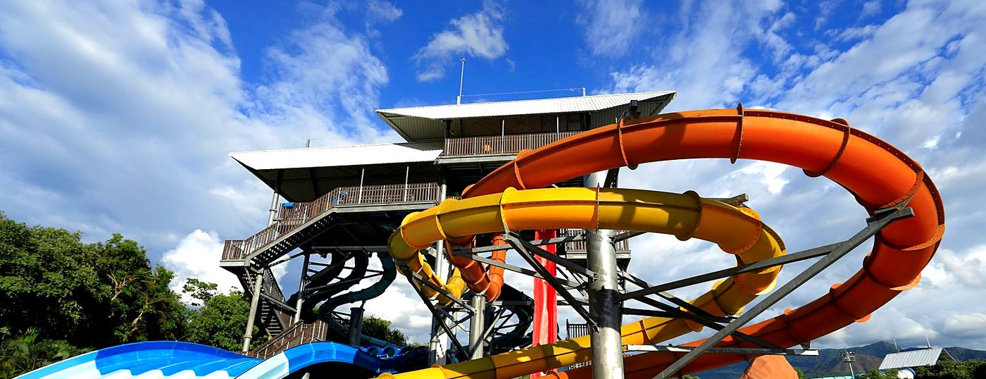 Colourful water slides at a water park near Melgar, Tolima, under a blue sky