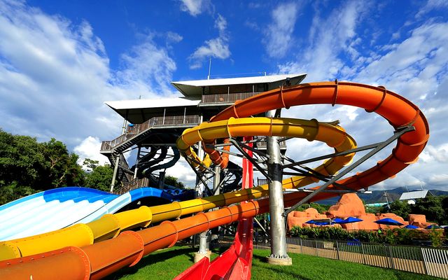 Colourful water slides at a water park near Melgar, Tolima, under a blue sky