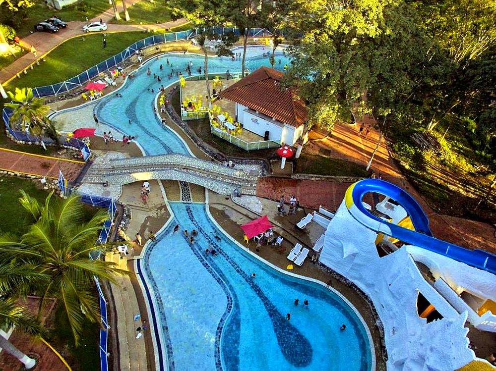 Aerial view of the lazy river and pools at a water park near Melgar, Tolima